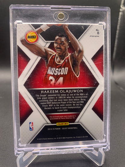 2014-15 Panini Select Basketball - Hakeem Olajuwon ‘Select Swatches’ Tie Dye /25 *Game-Worn Patch*